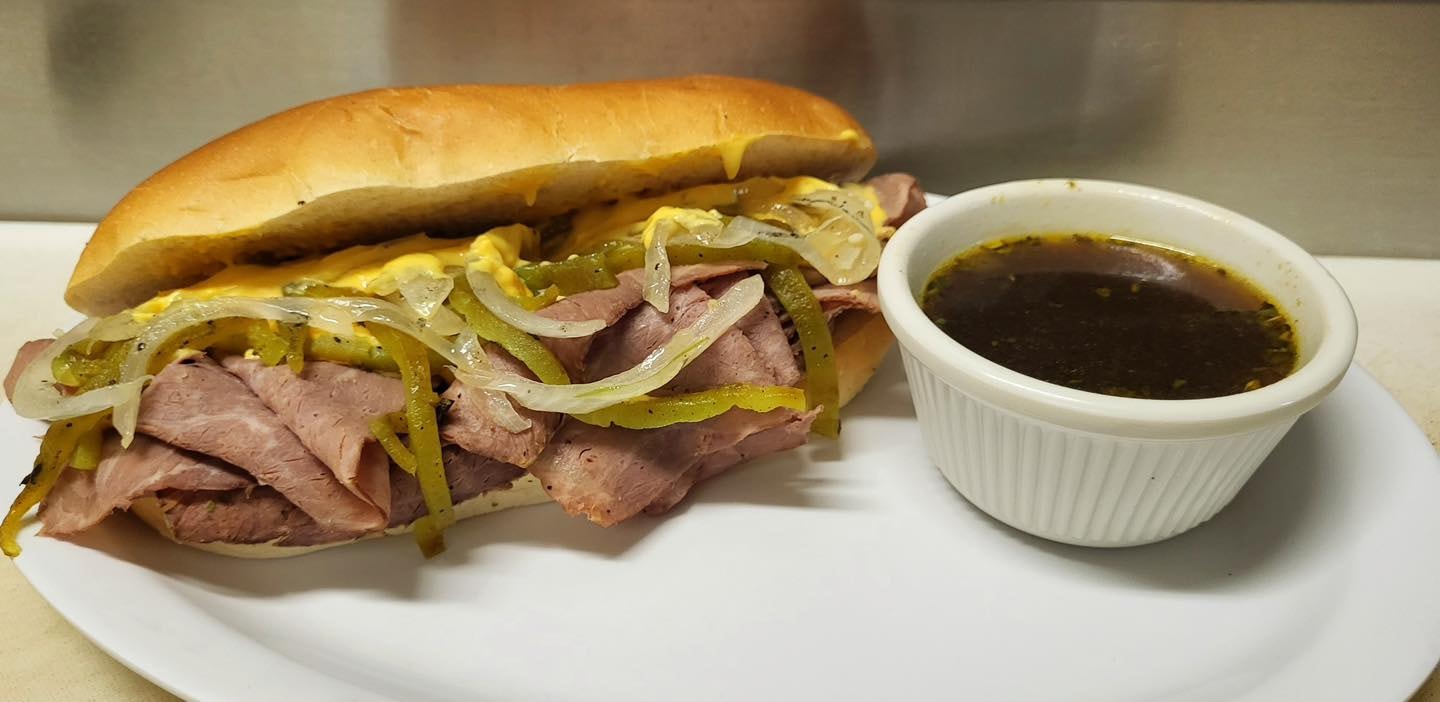 French dip roast beef sandwich with au jus at Brown Baer